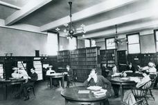People reading in old library